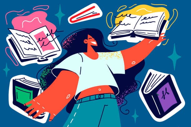 A student joyfully surrounded by open books